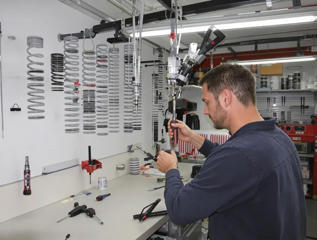 Norton Garage Door Repair safety certified technician performing precision spring replacement in Norton