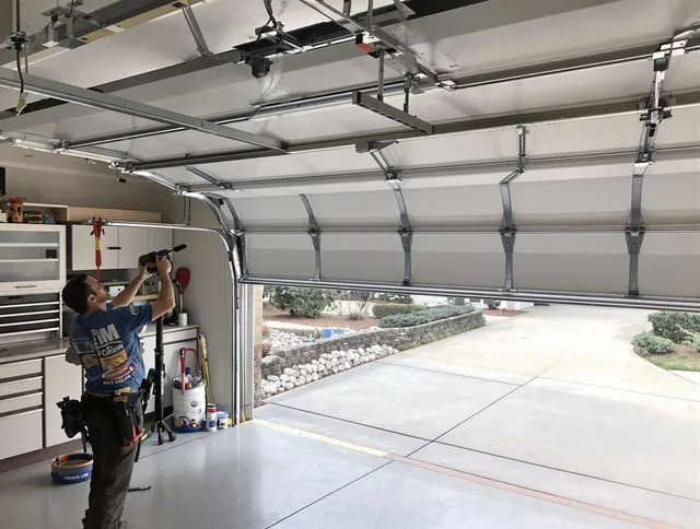 Garage door track repair service by Norton Garage Door Repair in Norton